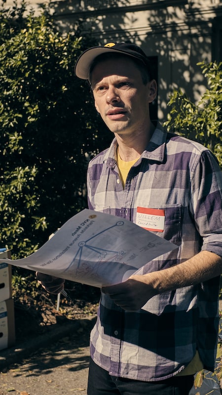 a man holding an instruction map